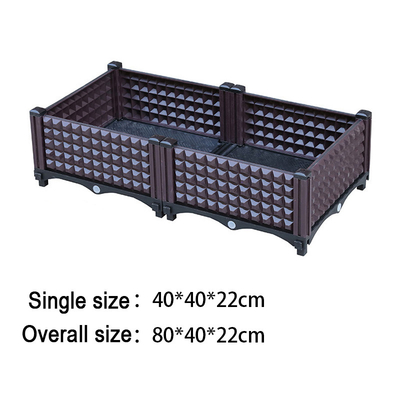 Le planteur augmenté en plastique de conception de rotin enferme dans une boîte 40*40*26CM extérieurs décoratifs