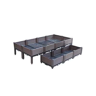 Lits augmentés en plastique personnalisables de jardin sur des jambes/boîtes en plastique de planteur avec des jambes