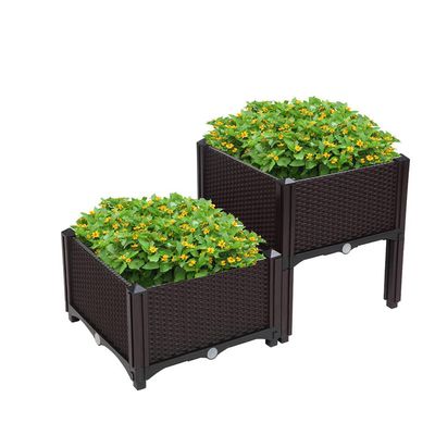 Le plastique adapté aux besoins du client extérieur d'intérieur a soulevé des planteurs de jardin sur l'antigel de jambes